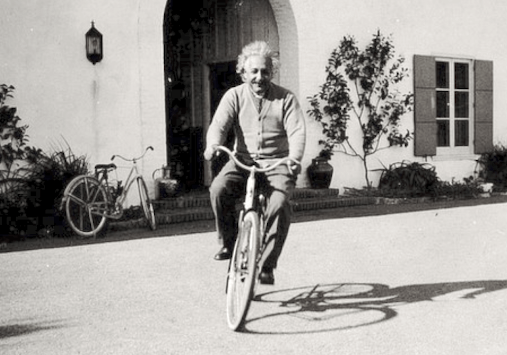 Einstein riding a bicycle